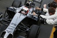 Kevin Magnussen returns to the pits after a podium finish to the cheers of the team.jpg